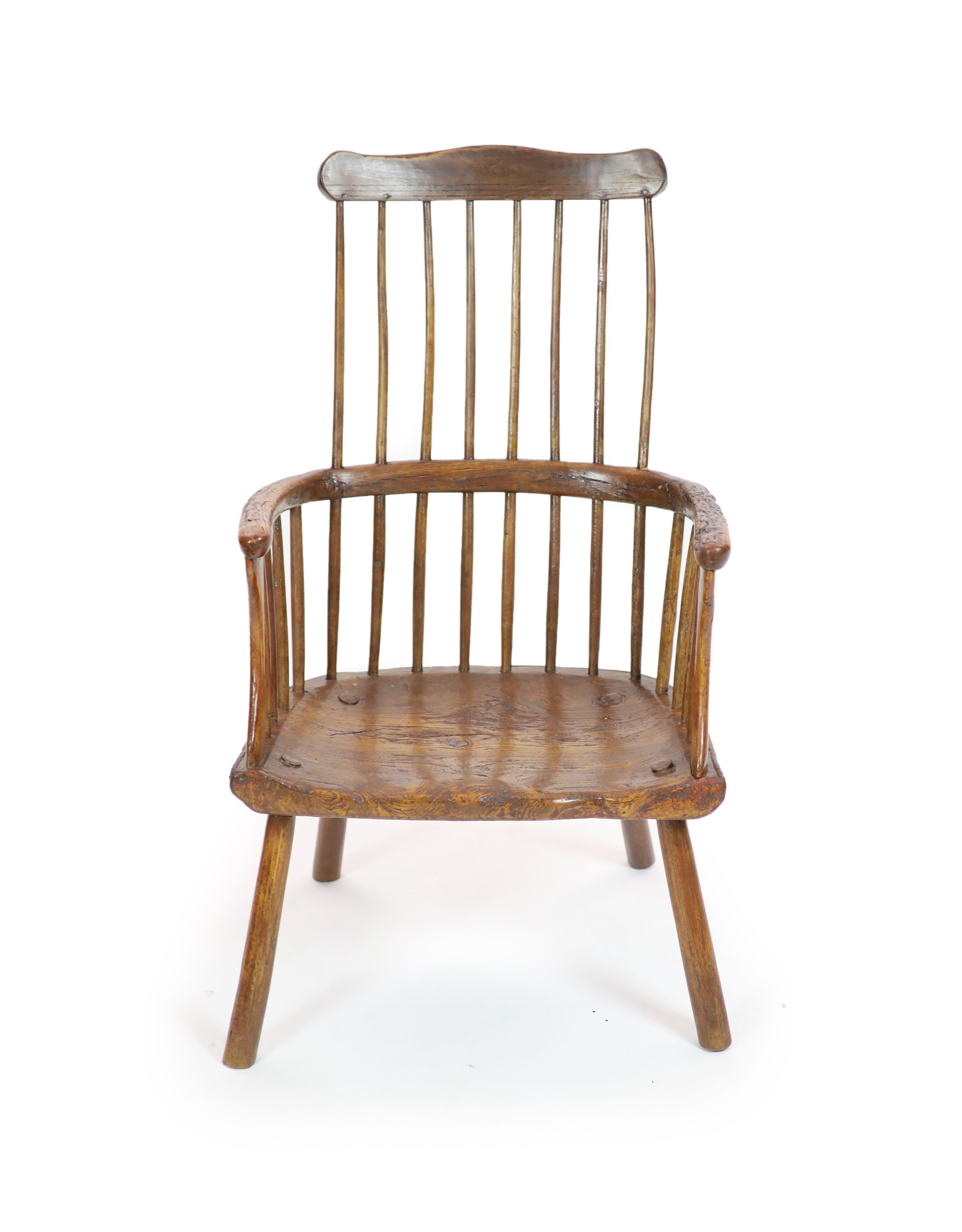 An 18th century West Country elm and fruitwood primitive armchair H 105cm. W 60 cm. D 58cm.